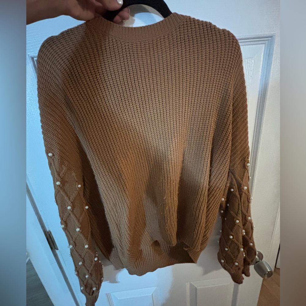 Brown sweater with pearls on sleeve